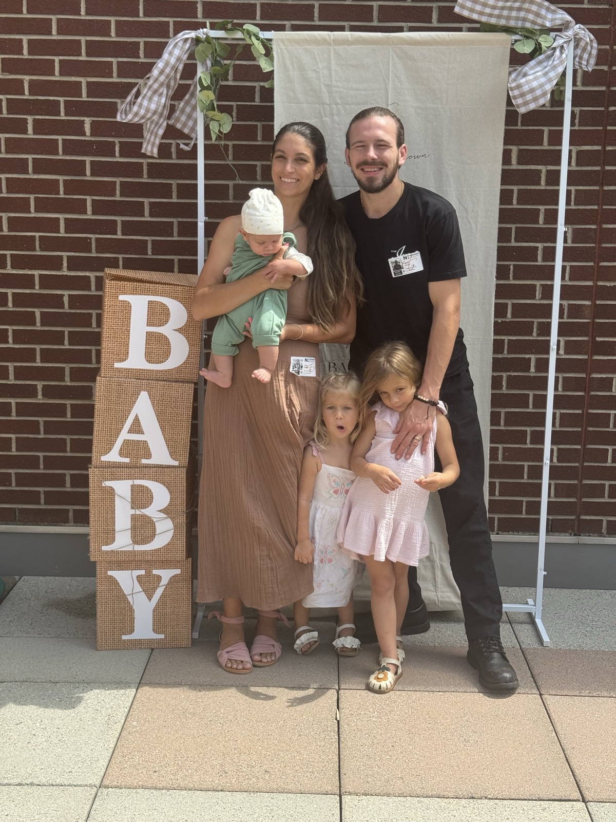 Emma Draper, Charlotte birth doula, with her husband and their four children.